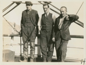 Image: Three men aboard
